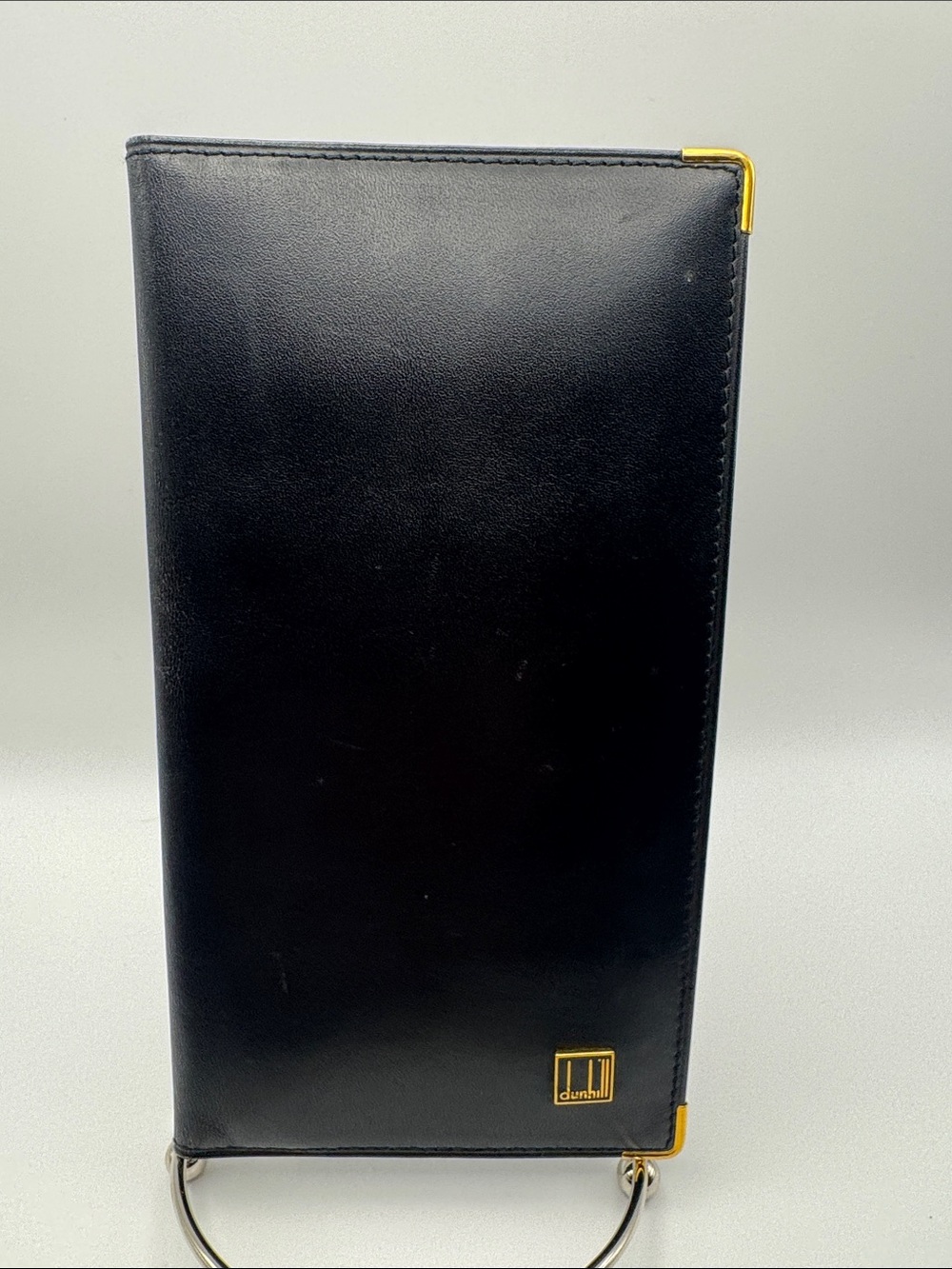 Dunhill Black Leather Folio Phone Case with Gold Corner and Logo Accents